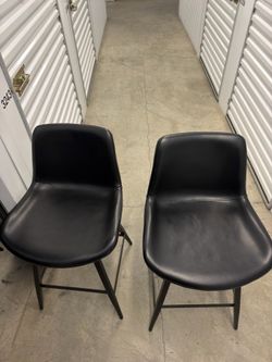 4 black stool chairs