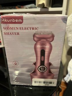 Woman, electric shaver brand new sealed