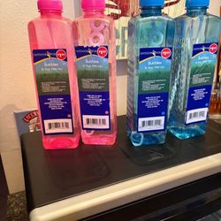 FOUR LARGE BOTTLBLOW BUBBLES