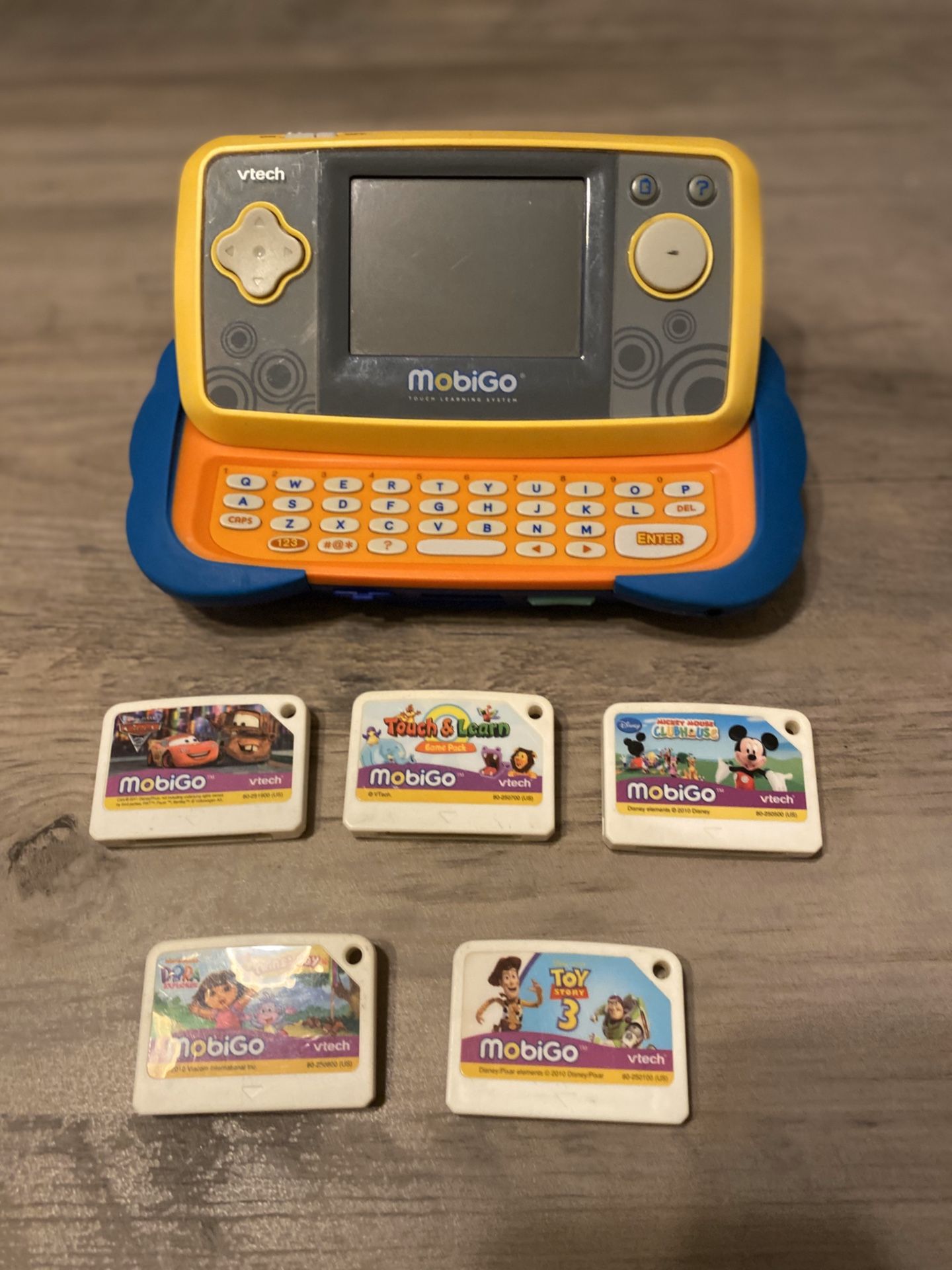 MobiGo Kids Electronics Game 5 game cartridges included