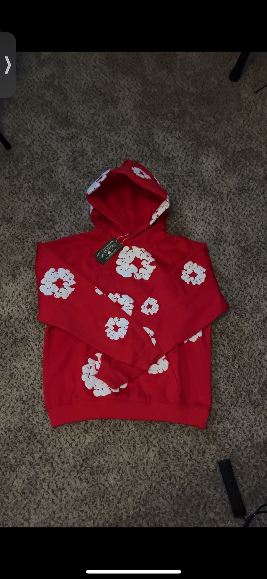 Red denim tear