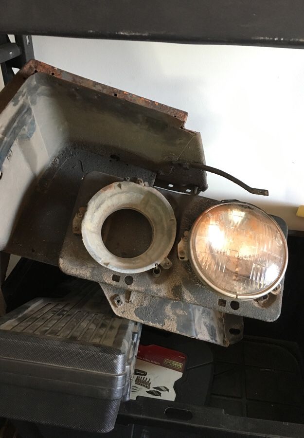 1970 Dodge Charger Headlight bezel and backing.