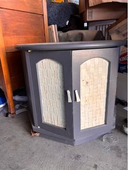 Gray corner cabinet
