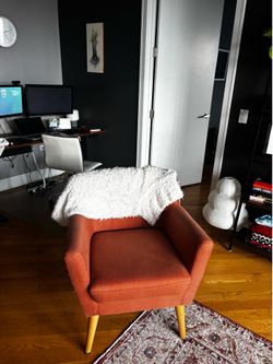 Orange arm chair