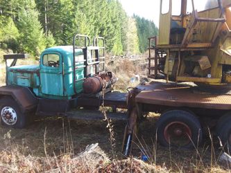 White "super mustang" w/log loader
