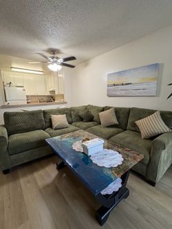 Green Corduroy Sectional Sofa with Pillows