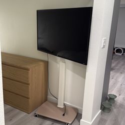 TCL TV with on wheel