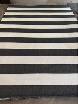 Black and white outdoor rug