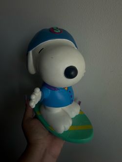 Snoopy skateboard piggybank