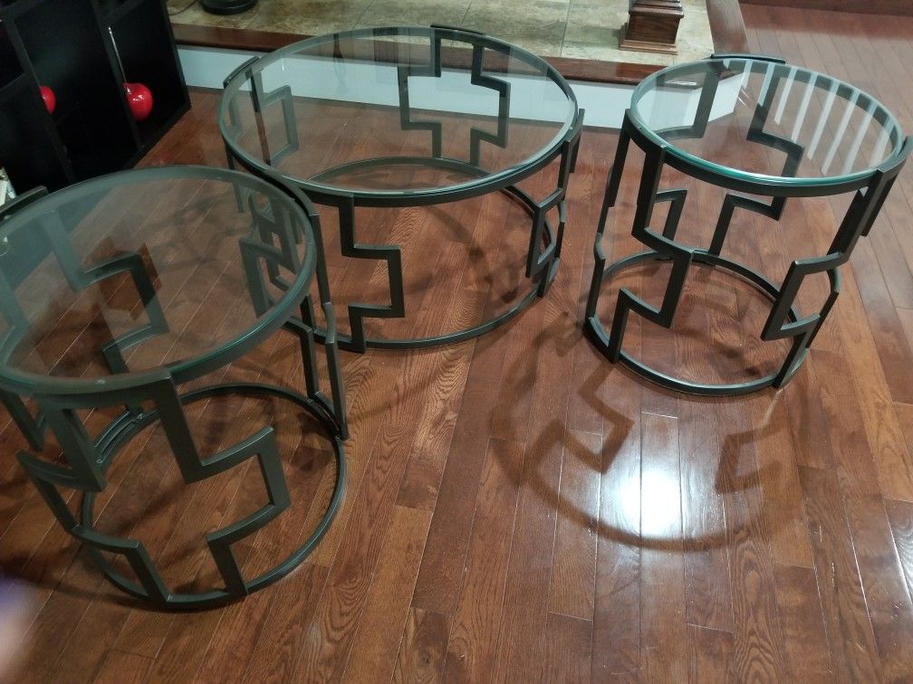 Modern glass coffee table and two side tables