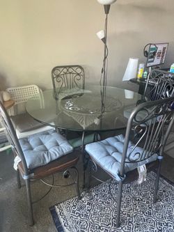 Dinning table, chairs with cushion pillows