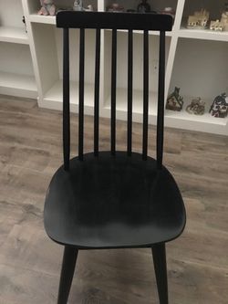 8 Black spindle back Chairs