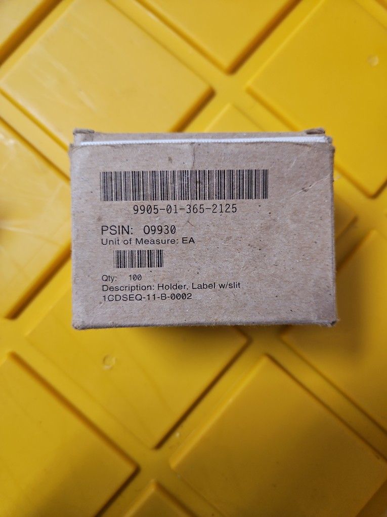 Label Holder With Slit