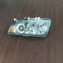 scion xb 2014 left headlight