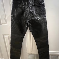 Men’s black laminated Jeans.
