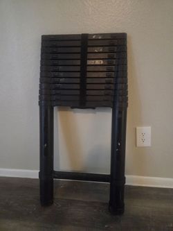 Like new telescoping 13 ft ladder