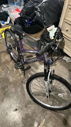 purple 24-inch Huffy Highland