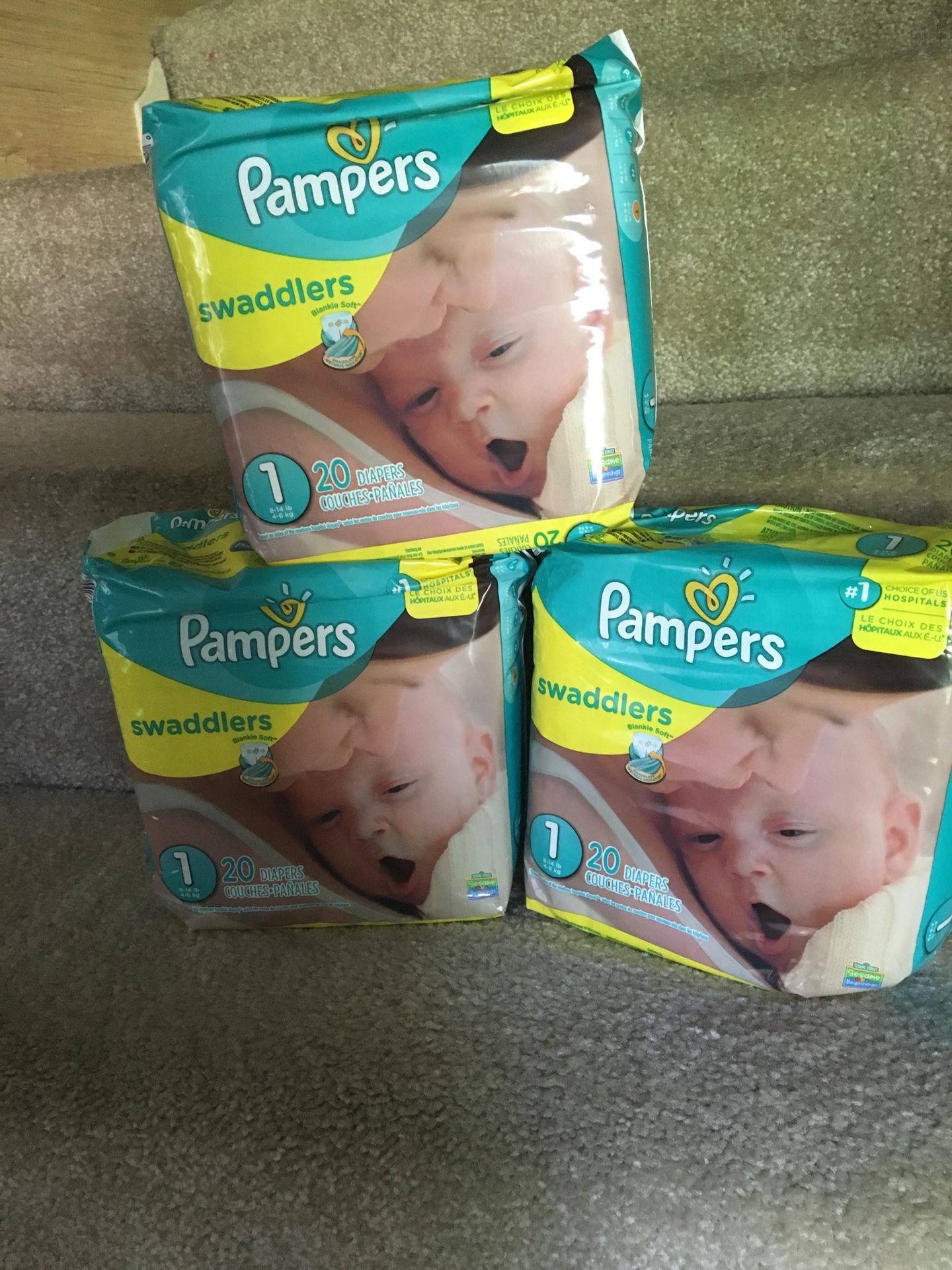 Size 1 diapers ($10 for 3 packs)