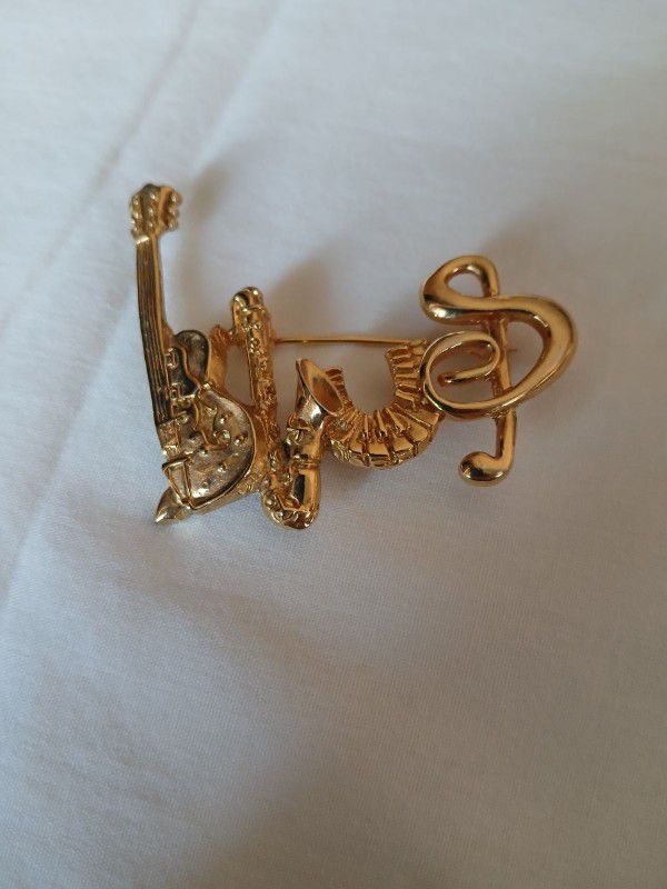 Vintage Pin With Instruments Spelling BLUES