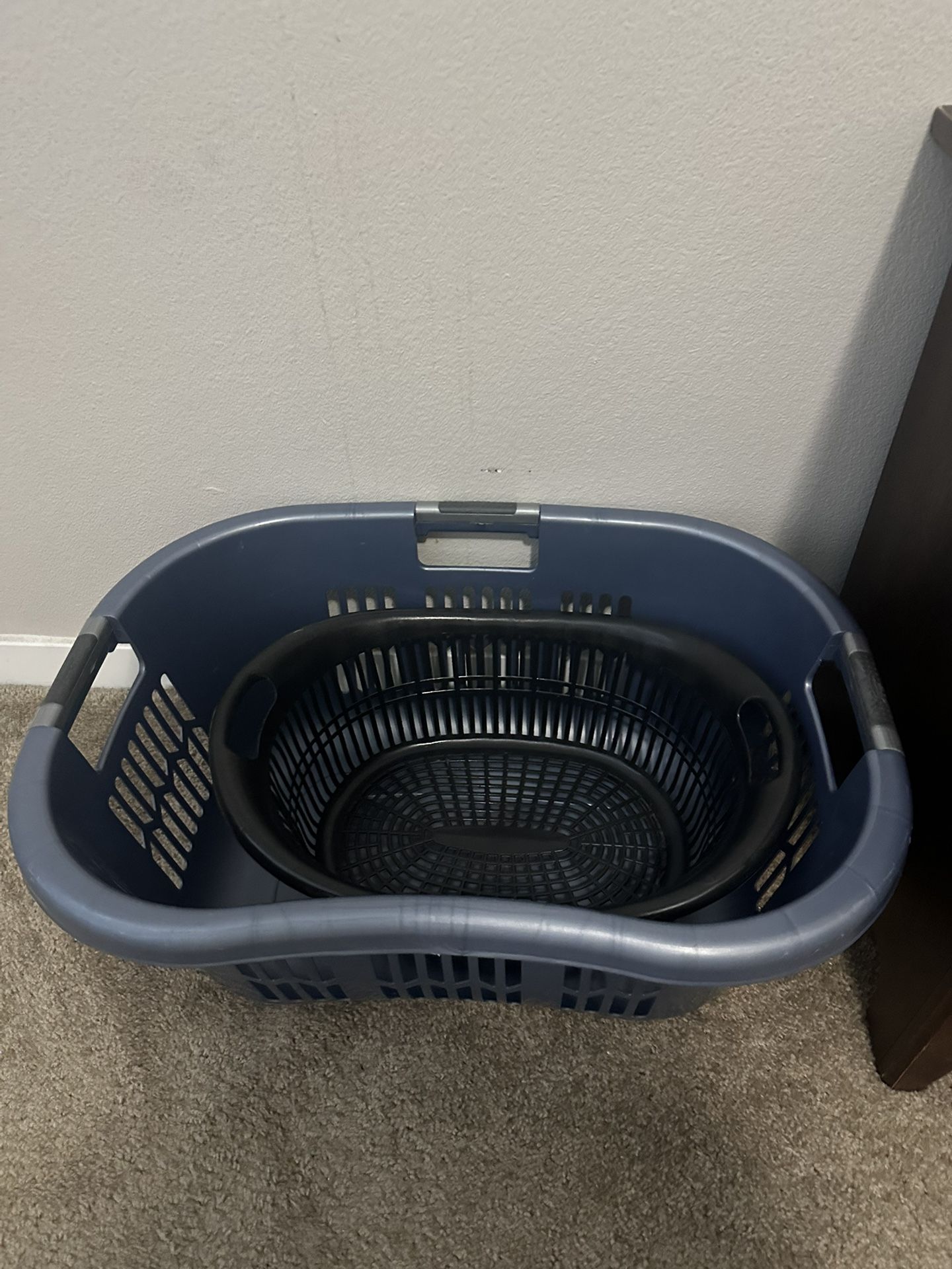 Two laundry baskets