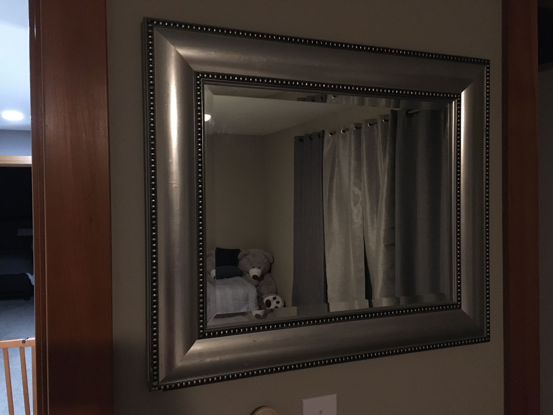 Silver bezzel wall mirror 22x26