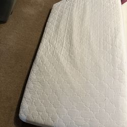Crib Mattress With Cover.