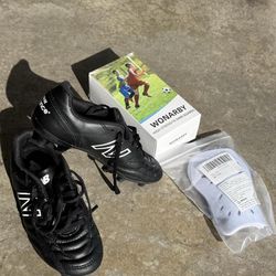 Kids soccer cleats and shin guards