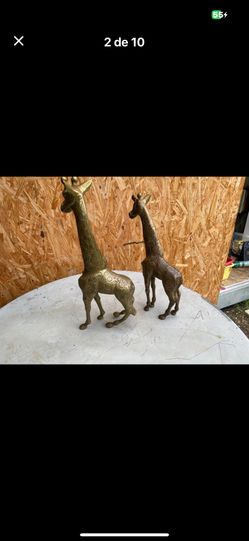 Vintage 1 pair of brass Giraffes the big 14.5 inch tall and small 12.5 inch tall $$60 firm