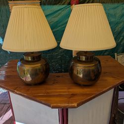 A pair of vintage brass lamps