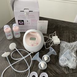 Spectra S2 plus electric breast pump (Like New) & NEW/sealed replacement parts package