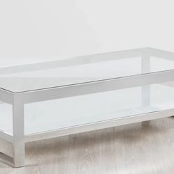 Rectangle  Coffee Table, Heavy, was $1,100. Stainless Steel Frame, Tempered Glass, Perfect Condition Size: 55W x 15H x 27.                      