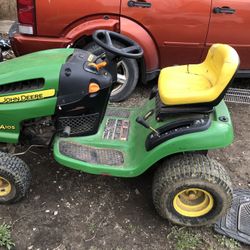 John Deere riding lawnmower