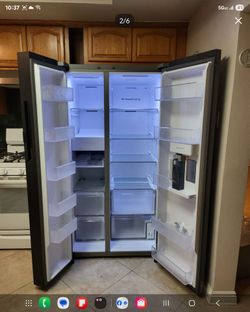 Samsung Side-by-Side Refrigerator excellent condition with motion door sensor