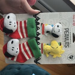 Snoopy socks and teething toy