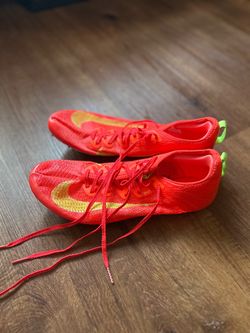 Nike Track Spikes Red and Gold size 10