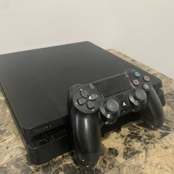 PlayStation 4 Slim (comes with controller) 