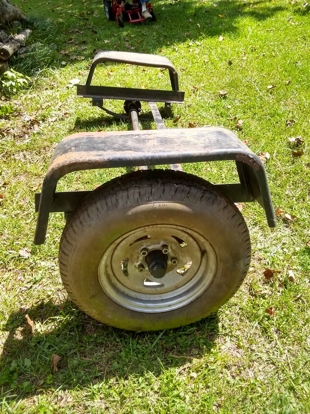 5 lug trailer axle with leaf springs, fenders and 1 tire