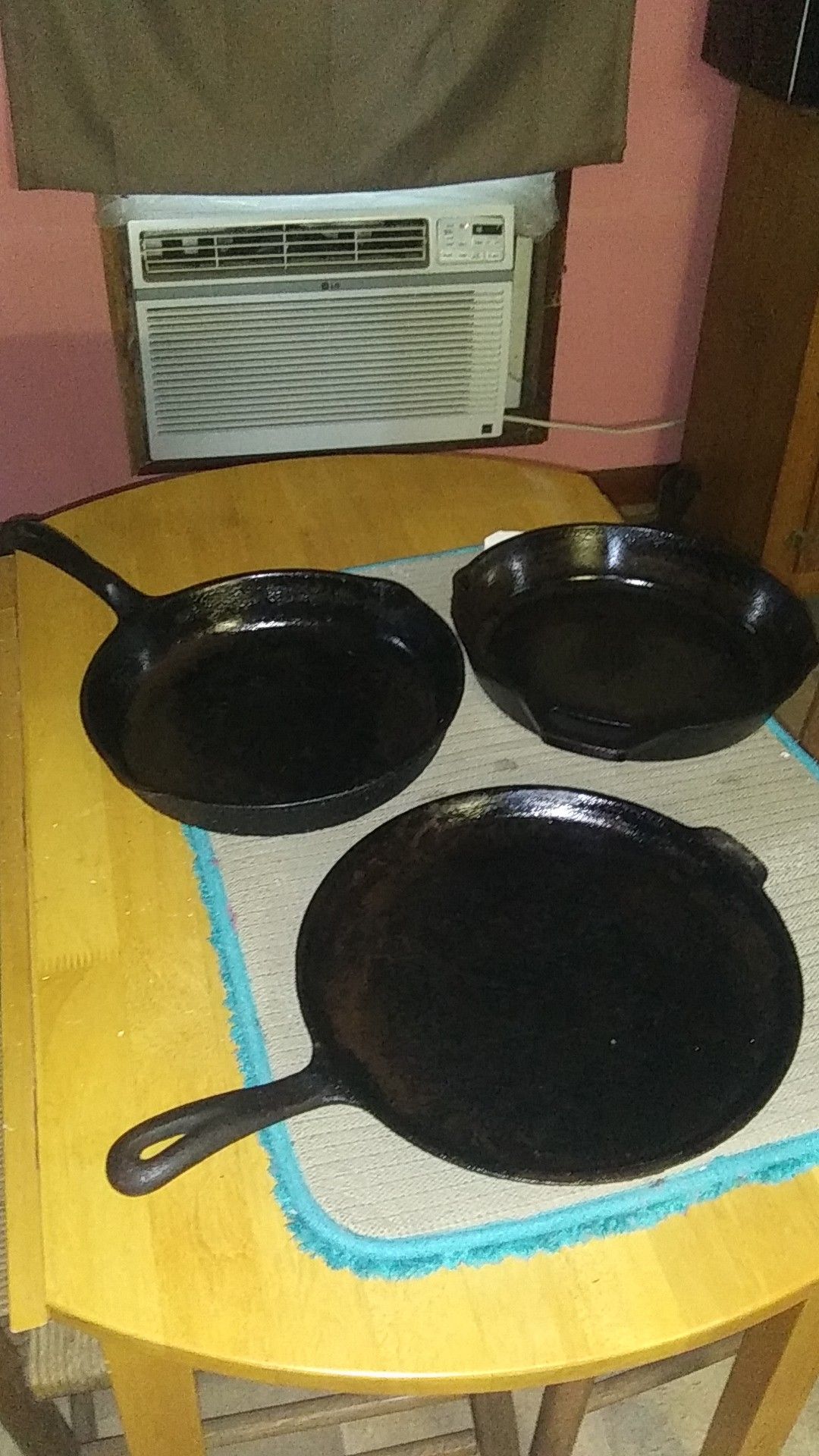 1/10 inch&1 /12inch Wagner"s orignal cast iron skillets,dated in1891 also 1/10inch Lodge iron skillet