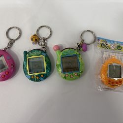 Vintage Bandai Tamagotchi Connection Lot - V3 & V4 - Frog, Pink & Flowers Shells