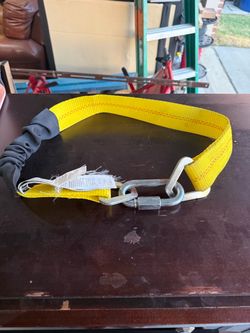 2 feet long, this is a restraint or positioning lanyard