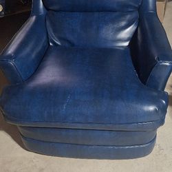 2 Blue Chairs 1 Is a Recliner , Other Has A Ottoman 