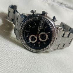 Gucci Chronoscope w/diamond bezel 2.5 carats