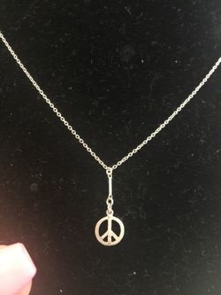 925 Sterling silver necklace.. Peace sign charm 1 gram 21" inches $10