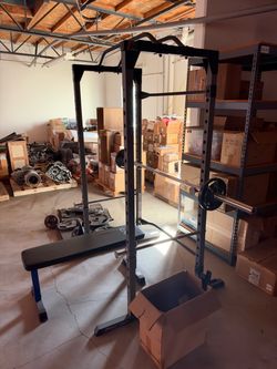 Power Rack with Barbell and Weight Plates