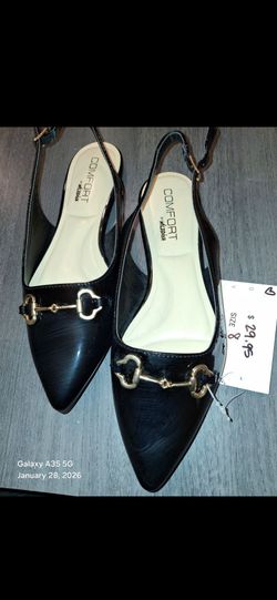 Women's Size 8 black patent slingback flats by Wild Diva feature a glossy finish