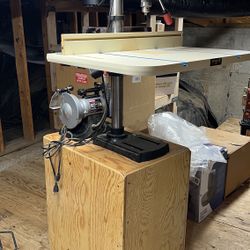 12 drill press with induction motor.