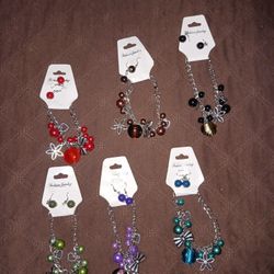 Charm Bracelets With Earrings  $6 Each