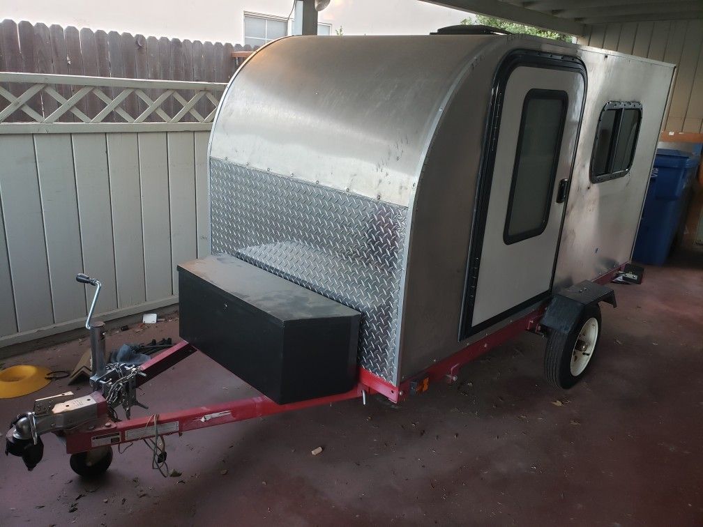 Teardrop style aluminum camper tiny home rv trailer WITH SOLAR