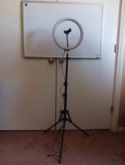 LED ring light on a tripod stand