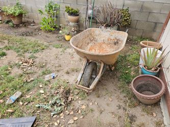 Metal wheel barrel